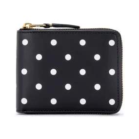 Cartera Comme Des Garçons Wallet en piel negra a lunares