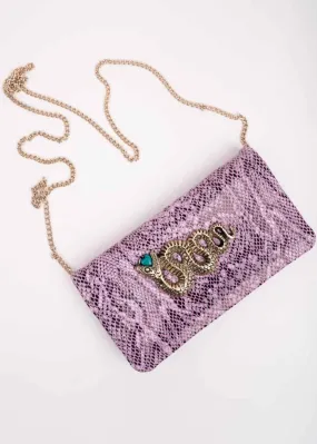 Cartera joya piel serpiente lila